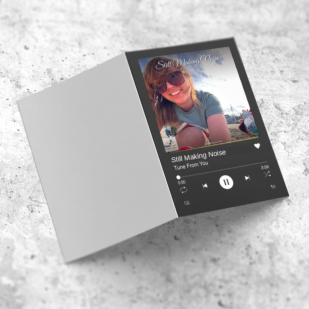 A5 greeting card open to a music-player front, with a photo, the title Still Making Noise, Tune From You and a track length