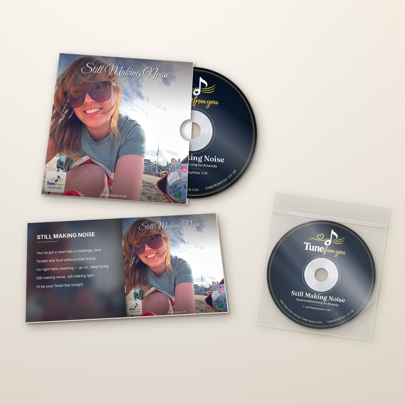 Professional printed CD of a personalised song, shown as a printed disc, in a clear sleeve, and in a printed card wallet