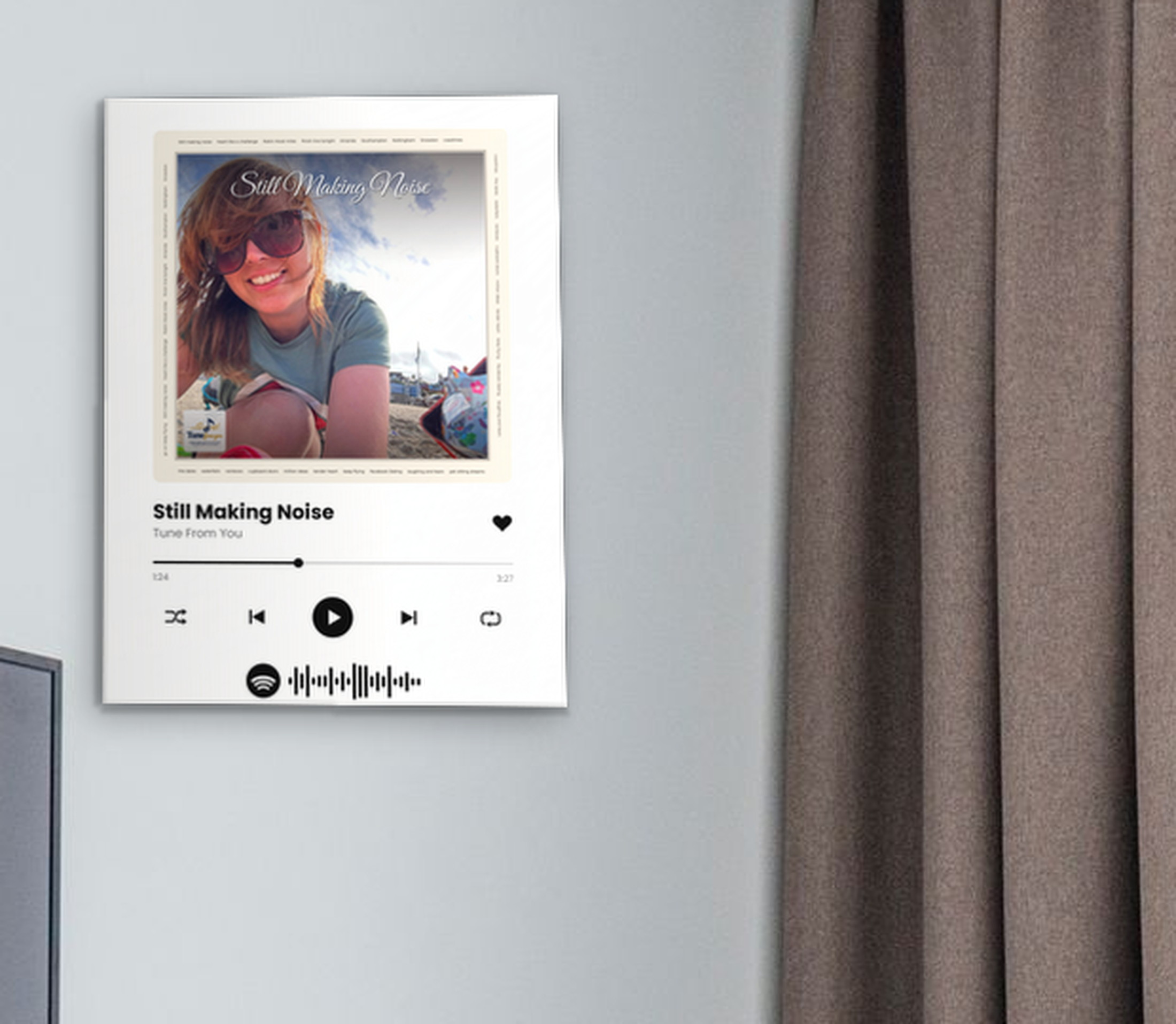 Personalised 12×16" song canvas on a wall with cover artwork and song title